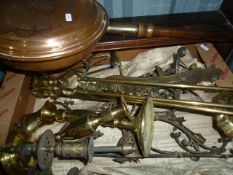 Various metalware including a brass trivet, fire irons, a copper warming pan, a pair of brass