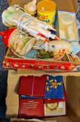 Two boxes of assorted items to include The Hummel Gold Christmas Ornament collection, Christmas tree