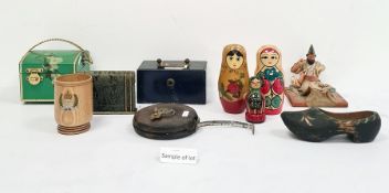Collection of boxes to include a miniature metal safe with carry handle, a brass candleholder,