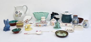 Poole pottery tableware, Poole pottery model dolphins, posy vases, a Sylvac blue pottery rabbit,