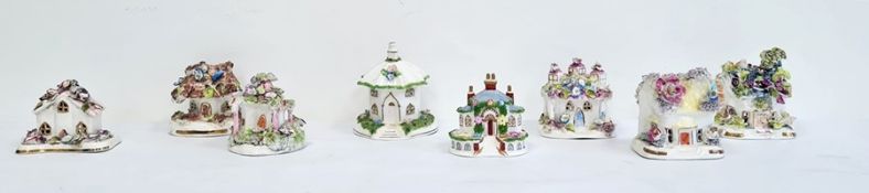 Collection of eight various bone china porcelain and pottery incense burners in the form of cottages