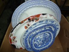 Six various large meat plates including Wedgwood 'Willow' pattern and one smaller (7)