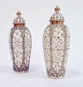 Pair of Worcester 'Grainger & Co' reticulated slender oviform Persian-style vases and domed