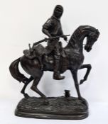 In the Manner of Alfred Barye; Bronze figure of a hunter carrying dead game, on horseback