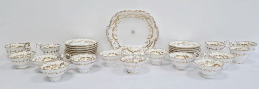 English porcelain part tea service, mid 19th century, pattern no. 4/987, gilt with fronds and