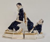 Pair of glazed pottery Royal Dux bookends styled as a pair of Pierrot (2)  Condition ReportThe