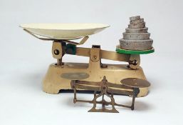 Pair of brass postal scales and a set of cream and green painted balance scales (2)