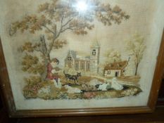 Late 19th century petitpoint needlework picture showing a boy sitting with a dog, dogs in the
