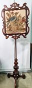 19th Century pole screen, with needlework panel and turned and carved stand