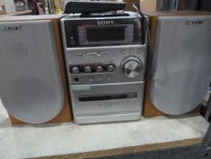 Sony music system and a Polaroid flatscreen television 23