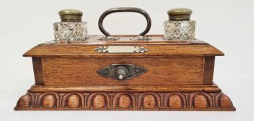 Late 19th century oak desktop inkwell with a pair of cut glass ink bottles with brass mounts and