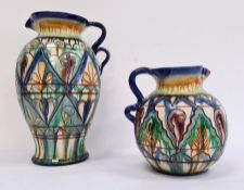 Pair graduated continental glazed terracotta jugs with sgraffito decoration (2)