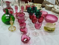 Green glass carafe, bulbous with clear spirally wrythen handle, a cranberry and white trailed