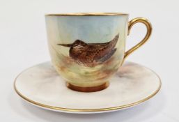Royal Worcester matched demi-tasse and a saucer, the cup with printed black marks, painted by J.