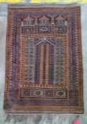 Persian rug, the brown ground with rich blue, cream and light brown decoration, approx 126cm x 88cm