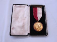 Gilt Masonic medal inscribed verso 'Honorable Testimonial of Masonic Charity and Benevolence,