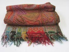 Early 20th century woven paisley shawl, allover colours green, red, turquoise, etc, the border in