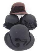 Quantity of hats by Sandra Phillipps including straw hats with linen and raw silk decorations and