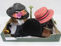 Vintage black straw hat with net detail, faux-flowers and a leaf, a pink straw boater labelled 'Miss
