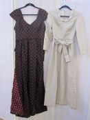 Dark pink cocktail dress, fitted waist, sleeveless, empire line with bow detail, full skirt with net