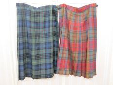 Two ladies' Scottish pure new wool kilts labelled James Pringle, Weavers of Inverness, sizes 22