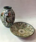 A large Denby stoneware vase, 30cm high and a Denby circular dish, 31cm in diameter both designed by