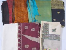 Seven silk saris, assorted colours (7)