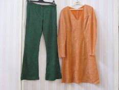 1960's HIan Rodin, London W1 green lurex bell bottom trousers, an orange lurex shift dress, 1960'
