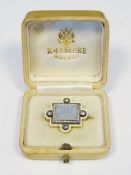 Carl Faberge chalcedony, diamond and white enamel brooch, rectangular and set with centre dome-cut