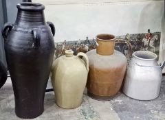 Stoneware flagon, a large decorative garden terracotta pot painted black, 77cm high and two other