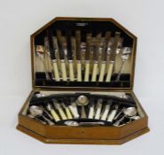 Cased set of silver-coloured metal flatware 