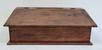 Stained pine student's table-top desk, the top with pen rest and recesses for ink bottles, above the