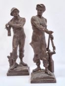 Pair of bronzed working men figures to include miner and blacksmith, on square wooden stands, 34cm