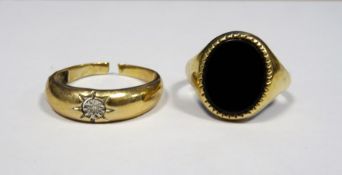 Gent's gold-coloured metal and onyx dress ring and a gent's gold-coloured ring set small diamond