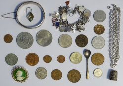 Silver charm bracelet, silver chain, silver bangle, cameo brooch, assorted coins, silver thimble,