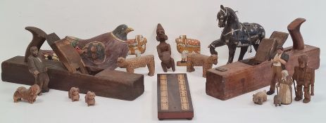 Various carved wooden animals to include jaguars, dogs, African carved figures, carved wooden