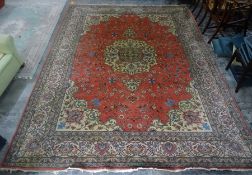 Pink ground Eastern rug with central medallion, foliate decorated field and stepped foliate