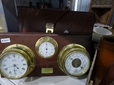 Leather briefcase, vintage boules set, camera tripod and flash umbrella, music stand, binoculars,