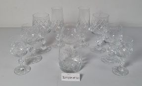 Large assortment of various cut glass wines and tumblers