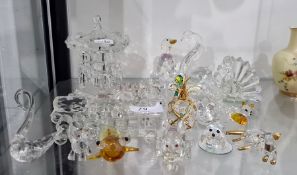 Quantity of Swarovski items to include swan, dog, rabbit, elephant, carousel, etc  Condition