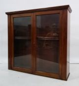 20th century mahogany two door display cabinet, cavetto moulded cornice above two glazed doors
