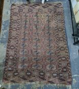 Eastern rug with 27 elephant foot guls, on a pink ground, in pinks, whites and blues, 149cm x