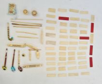 A quantity of plain rectangular bone counters (five stained red), and boned sewing and knitting