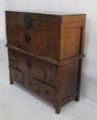 Reproduction Chinese marriage-type cupboard with lift top above pair of cupboard doors flanked by