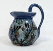Brannam Barum pottery jug, possibly by Liverton, flared and having sgraffito decoration of a fish on