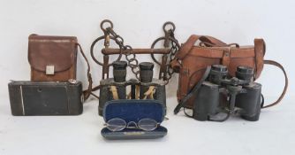 'Anslo' folding camera in brown leather case, a pair of Prinz 8x30 binoculars in brown leather case,