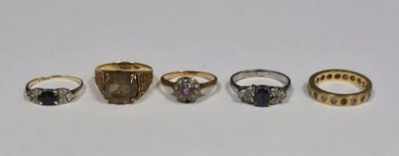 9ct gold ring with yellow-coloured stone, 2g total, a gold(?) full eternity ring with white