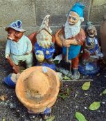 Eight various garden gnomes including sleeping Mexicans