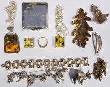Quantity of costume jewellery to include silver charm bracelets, compacts, silver and