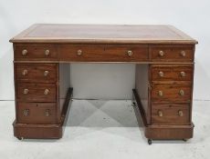 Late 19th century mahogany pedestal desk with red leatherette inset top, nine assorted drawers,
